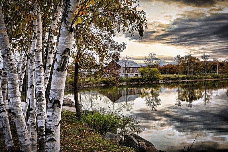 Image taken by Craig Jackson of a farm by a lake.